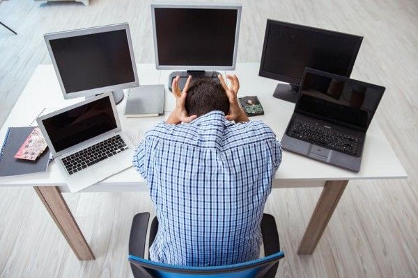 Frustrated worker at desk